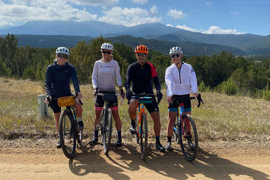 Image of four Tailwind employees standing for a picture with their gravel bikes in Trinidad, CO